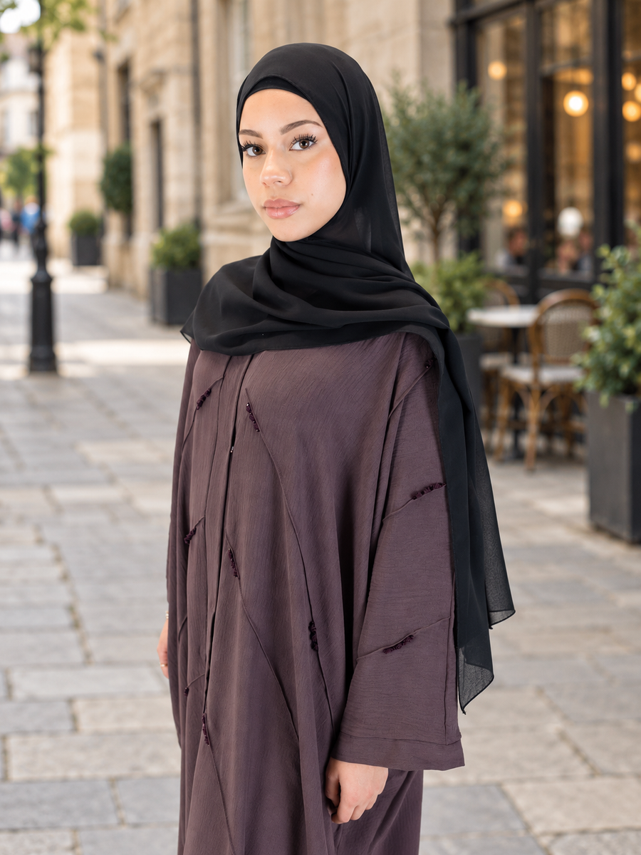 Black Plain Chiffon Scarf styled with a plum outfit on a stone city street