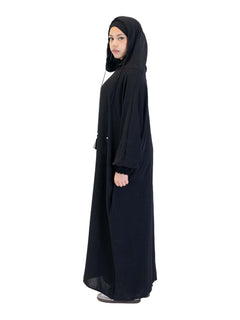 Black Urban hooded abaya on a model - side view