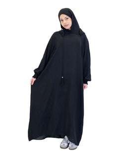 Black Urban hooded abaya on a model - front view showing the relaxed silhouette