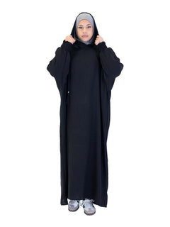 Black Urban hooded abaya on a model - front view worn over a grey hijab
