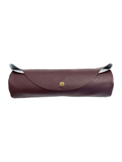 Maroon faux-leather travel prayer mat rolled for storage