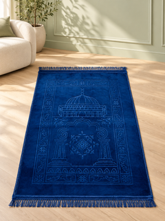 Blue Large Velvet Prayer Mat laid flat on a light oak floor