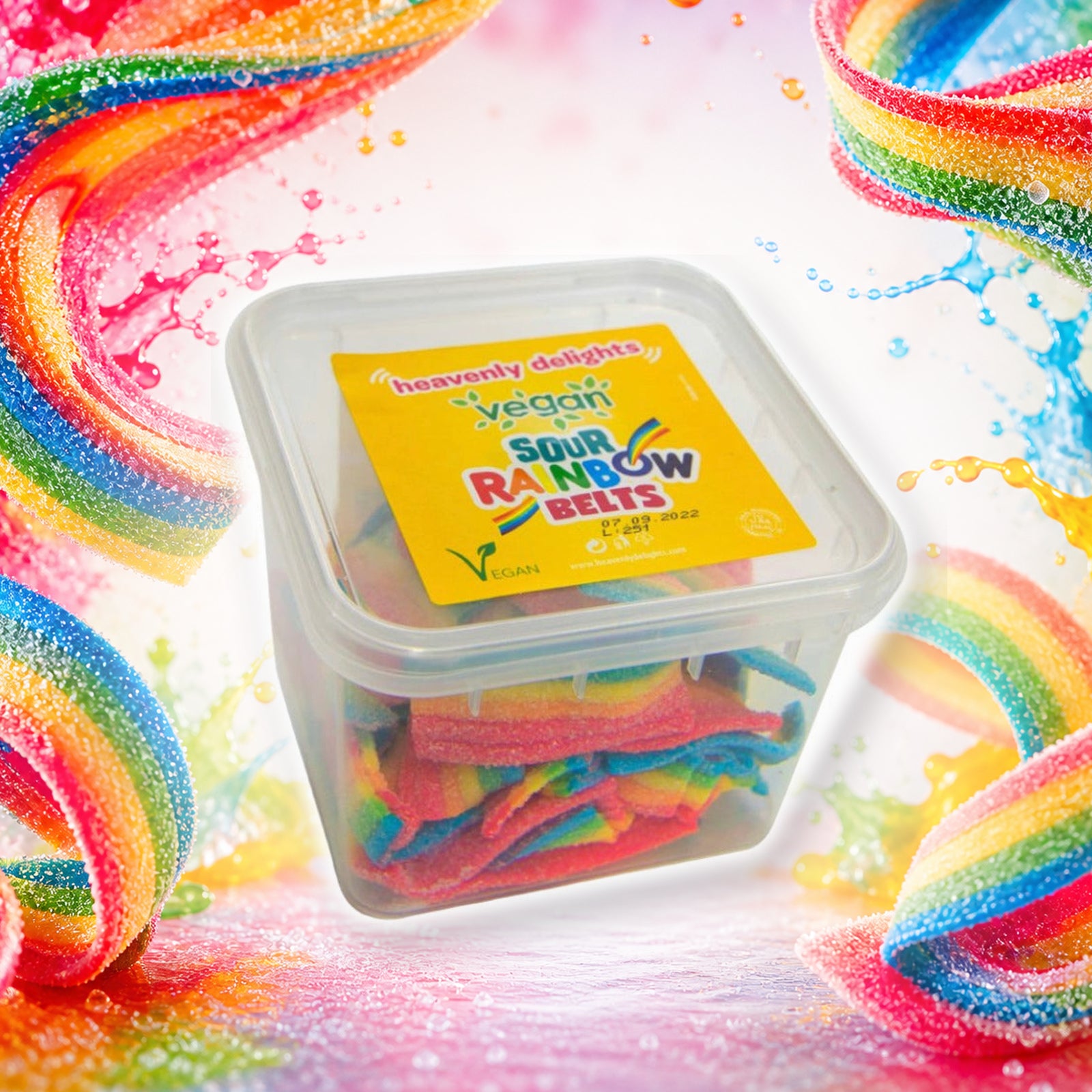 Vegan Sour Rainbow Belts - Heavenly Delights - 140g Tub in a vivid rainbow belts sweets scene