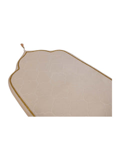 Beige mihrab prayer mat surface and border detail