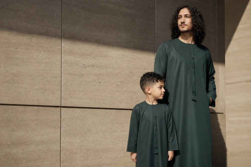 Father and son matching Omani Tassel Thobes