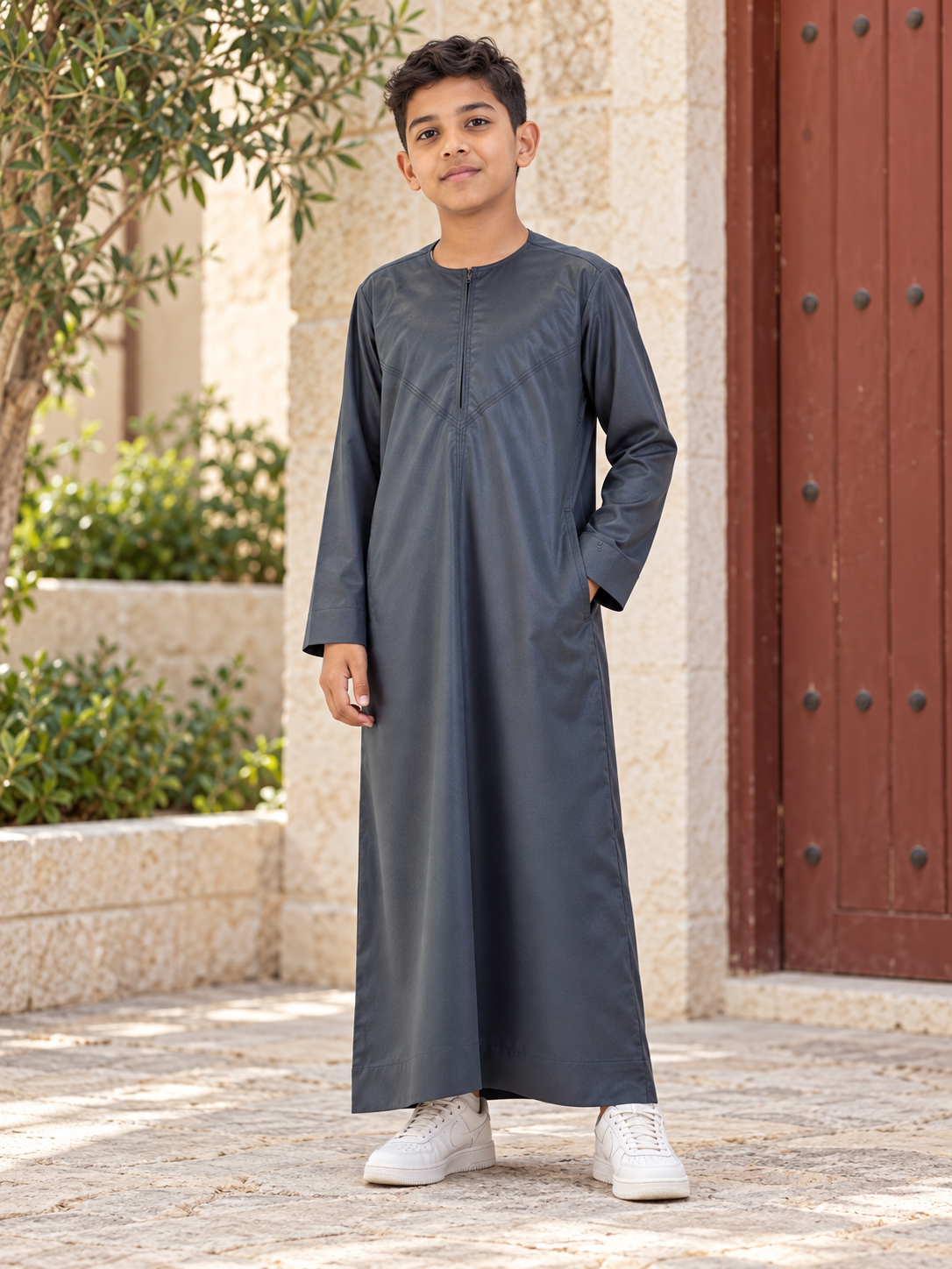 Islamic Impressions Boy's Silky Thobe in Dark Green — Lifestyle view