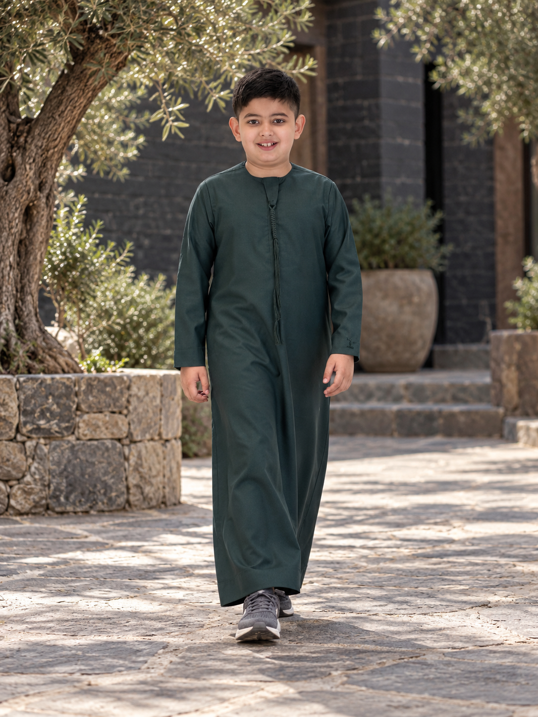 Islamic Impressions Boy's Omani Tassel Thobe in Dark Green — Lifestyle view