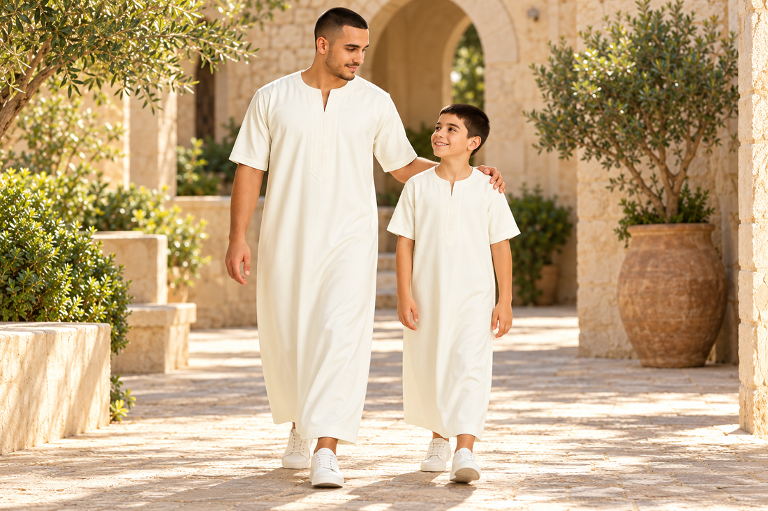 Father and son wearing Cream Moroccan thobes in a courtyard