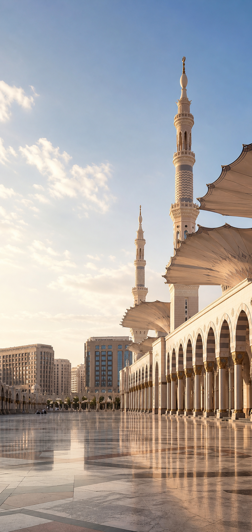 Contemporary Madinah courtyard and Prophet Mosque architecture in morning light